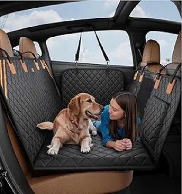 Dog car seat cover and travel hammock in black on white background