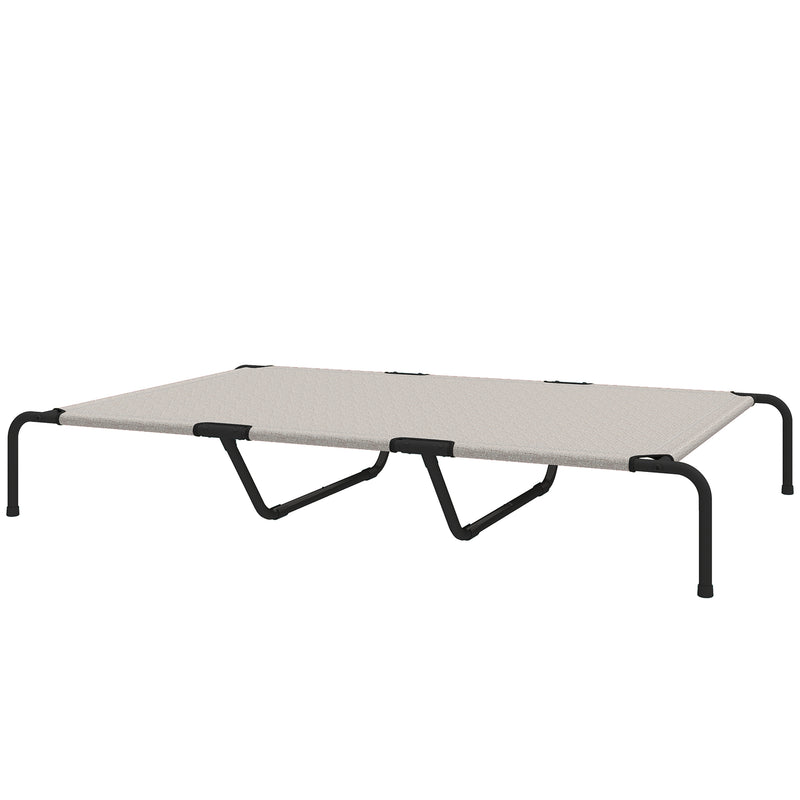 Elevated dog bed used outdoors at campsite – indoor and outdoor use